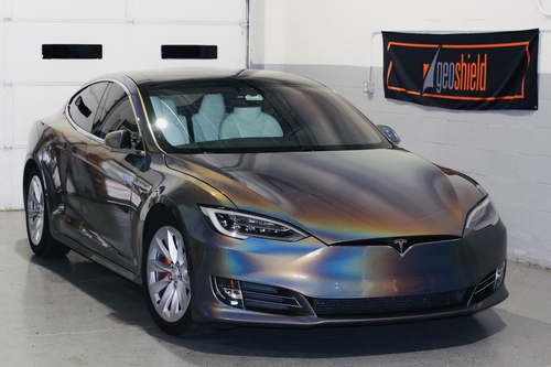 A chrome vinyl wrapped Tesla in Birmingham